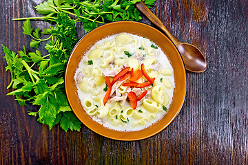 Image showing Soup creamy of chicken and pasta with pepper in plate on table t