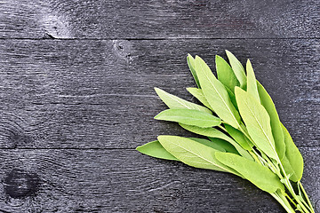 Image showing Sage leaves on black wooden board