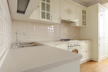 Image showing Classic cream colored kitchen closeup