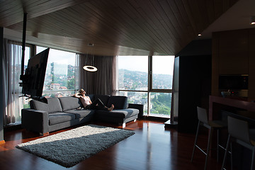 Image showing woman using tablet in beautiful apartment