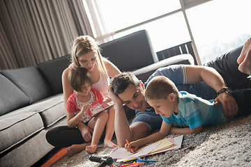 Image showing young couple spending time with kids