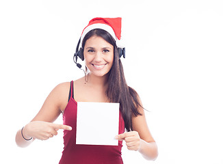 Image showing Christmas phone operator woman showing blank signboard