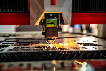 Image showing CNC Laser cutting of metal, modern industrial technology.