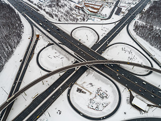 Image showing Aerial view of a freeway intersection Snow-covered in winter.
