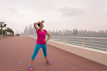 Image showing woman stretching and warming up