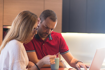 Image showing happy young couple buying online