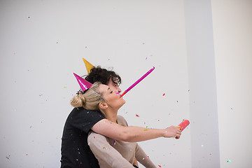 Image showing romantic young  couple celebrating  party with confetti