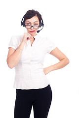 Image showing Beautiful young call-center assistant smiling , isolated on white