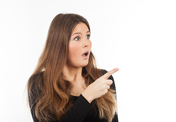 Image showing Beautiful young woman showing blank signboard