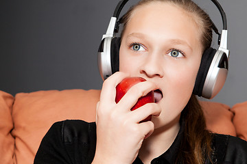 Image showing happy girl listening to music