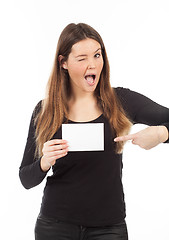 Image showing Beautiful young woman showing blank signboard