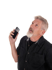 Image showing Middle age man frustrated with his phone