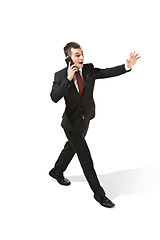 Image showing Funny cheerful businessman over white background