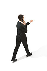 Image showing The back of businessman over white background