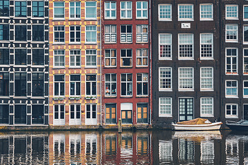 Image showing Amsterdam canal Damrak with houses, Netherlands