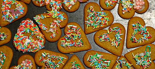 Image showing Homemade christmas cookies on a dark table