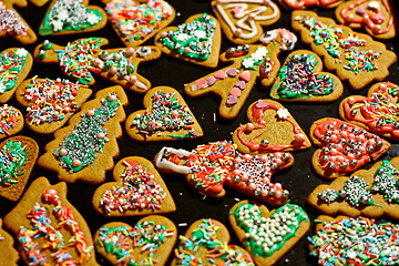 Image showing Homemade christmas cookies on a dark table