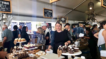 Image showing Booth selling delicious sweets at a Neighbourgoods Market at the waterfront of Cape Town, South Africa.