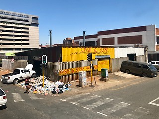 Image showing A scrap dealer is housing its garbage on the streets of Johannesburg, South Africa