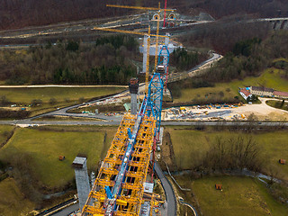 Image showing Aerial of a complex new railway bridge construction between two tunnels