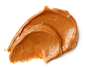 Image showing melted caramel on a white background