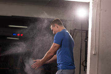 Image showing Gym Chalk Magnesium Carbonate hands clapping man