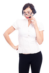 Image showing Beautiful young call-center assistant smiling , isolated on white