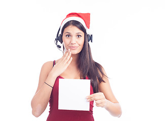 Image showing Christmas phone operator woman showing blank signboard