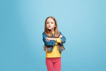 Image showing Young serious thoughtful teen girl. Doubt concept.