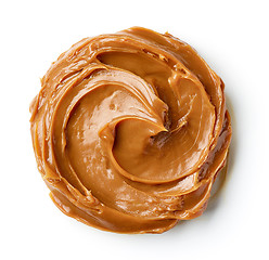 Image showing melted caramel on a white background