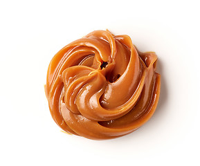 Image showing melted caramel on a white background