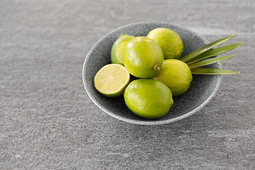 Image showing close up of whole limes in bowl