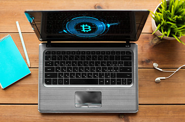 Image showing laptop computer with bitcoin symbol on screen