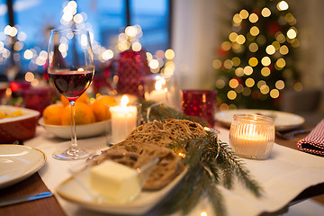 Image showing bread slices and other food on christmas table