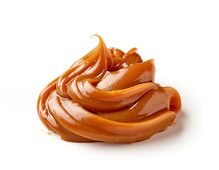 Image showing melted caramel on a white background