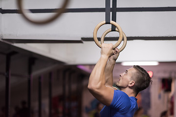 Image showing man doing dipping exercise