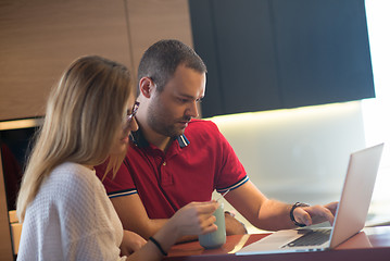 Image showing happy young couple buying online