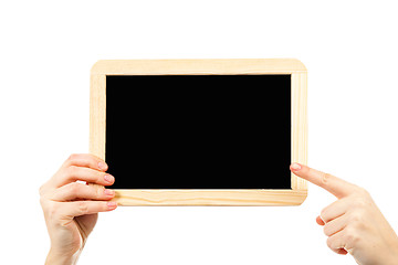 Image showing woman\'s hands holding a blackboard publicity