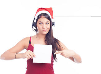 Image showing Christmas phone operator woman showing blank signboard