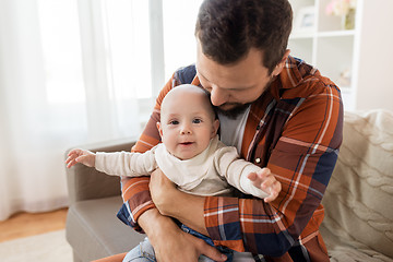 Image showing close up of father with little baby boy at home