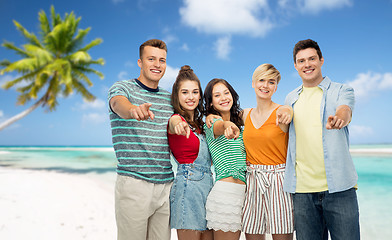 Image showing friends pointing at you over beach background