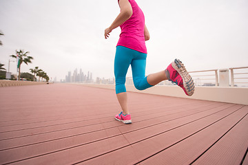 Image showing woman running on the promenade