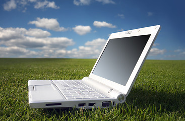 Image showing white laptop in nature