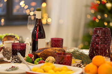 Image showing food and drinks on christmas table at home