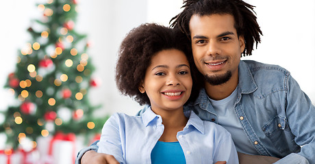 Image showing happy couple hugging on christmas