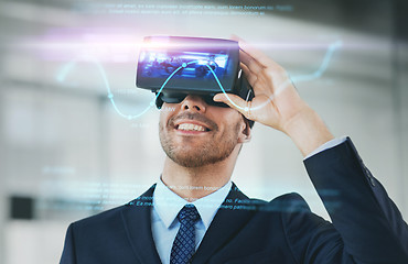 Image showing businessman with virtual reality headset at office