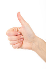 Image showing Woman giving thumb-up for showing success. Woman\'s right hand is nice idea.