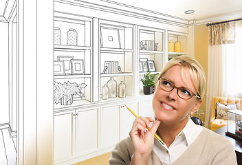 Image showing Young Woman Over Custom Built-in Shelves and Cabinets Design Dra