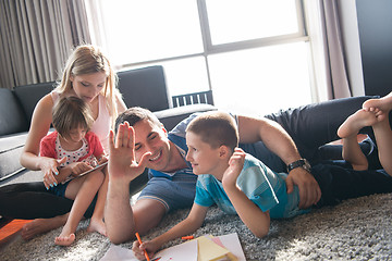 Image showing young couple spending time with kids