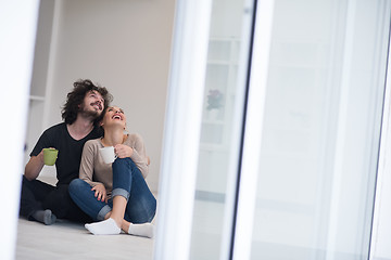 Image showing young couple in their new home